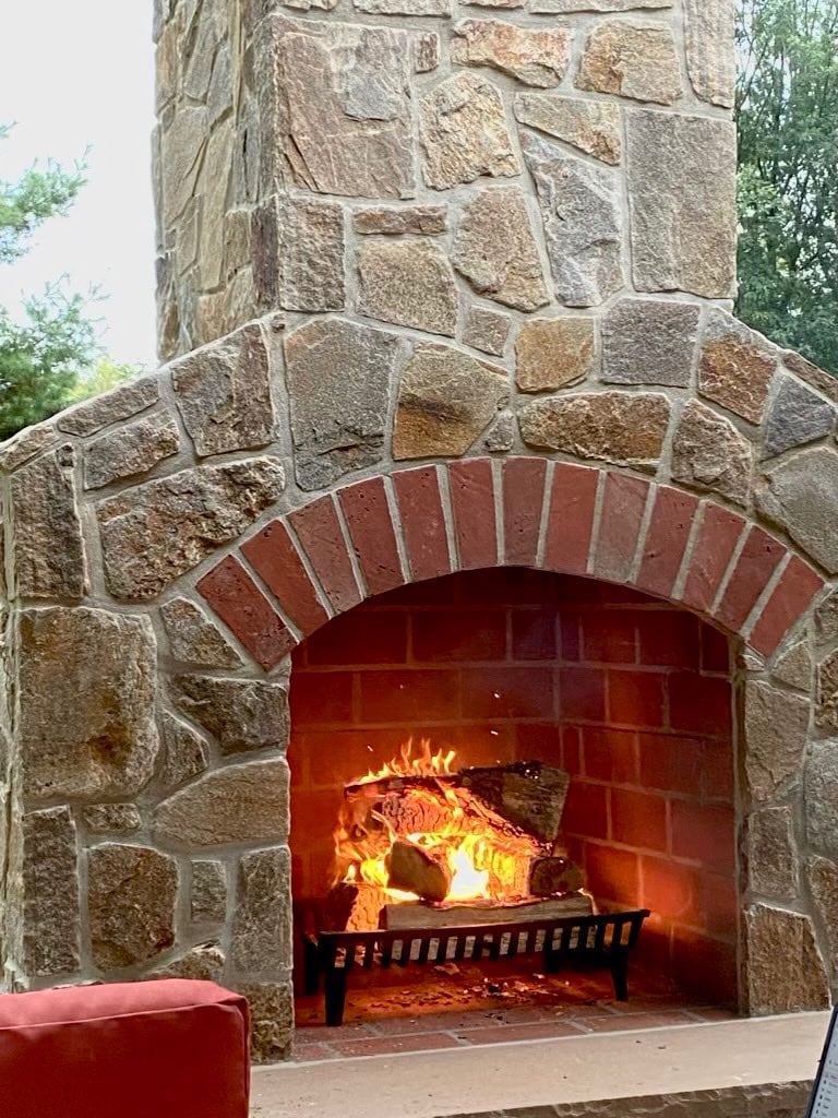 Custom Outdoor Fireplace by First Class Lawn Care