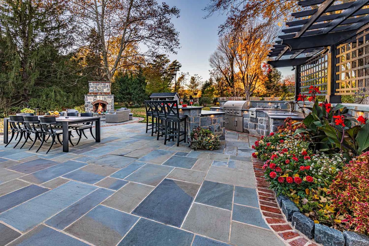 Custom Outdoor Kitchen With Landscaping by First Class Lawn Care