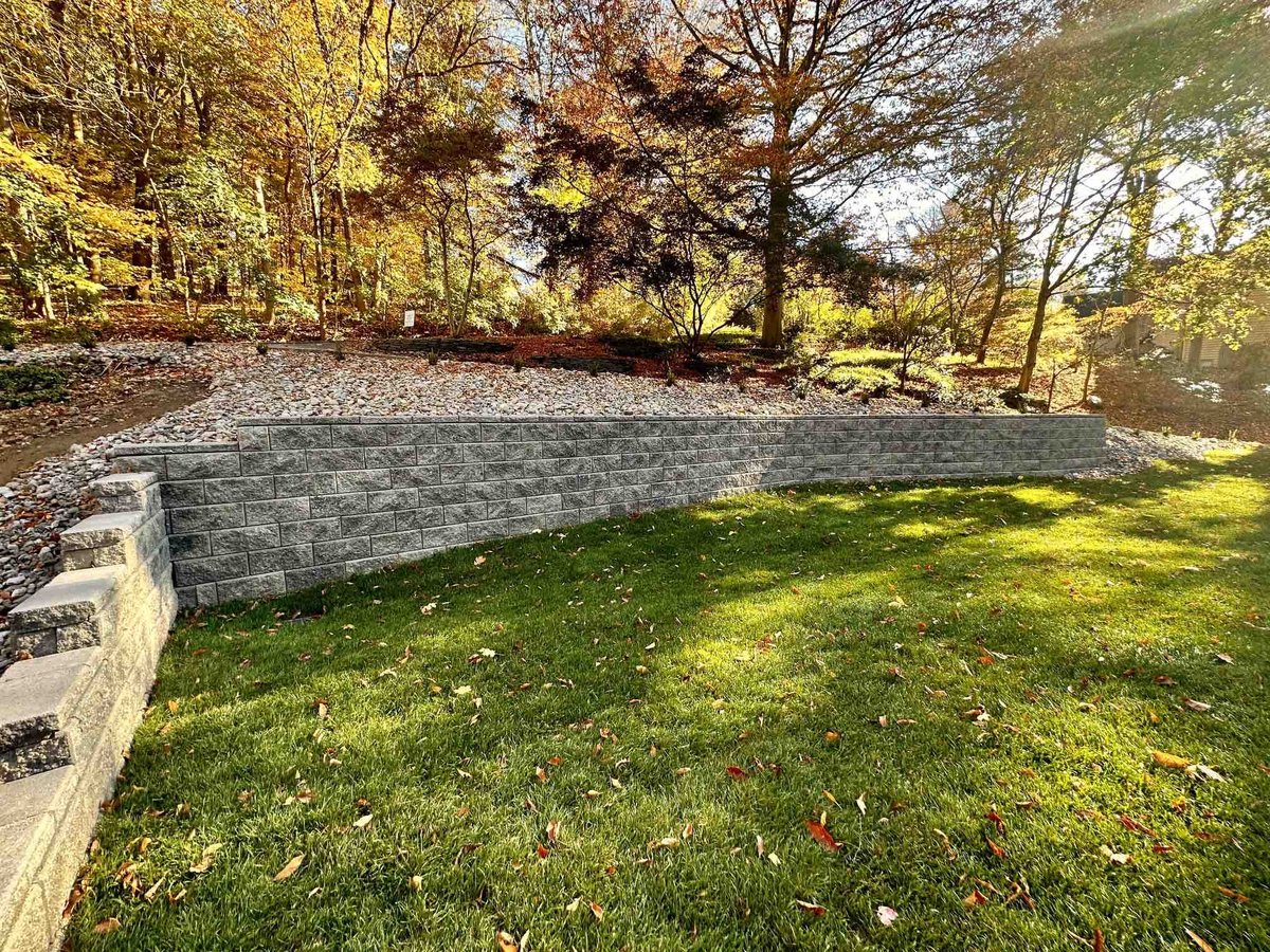 Hardscaped Retaining Wall by First Class Lawn Care