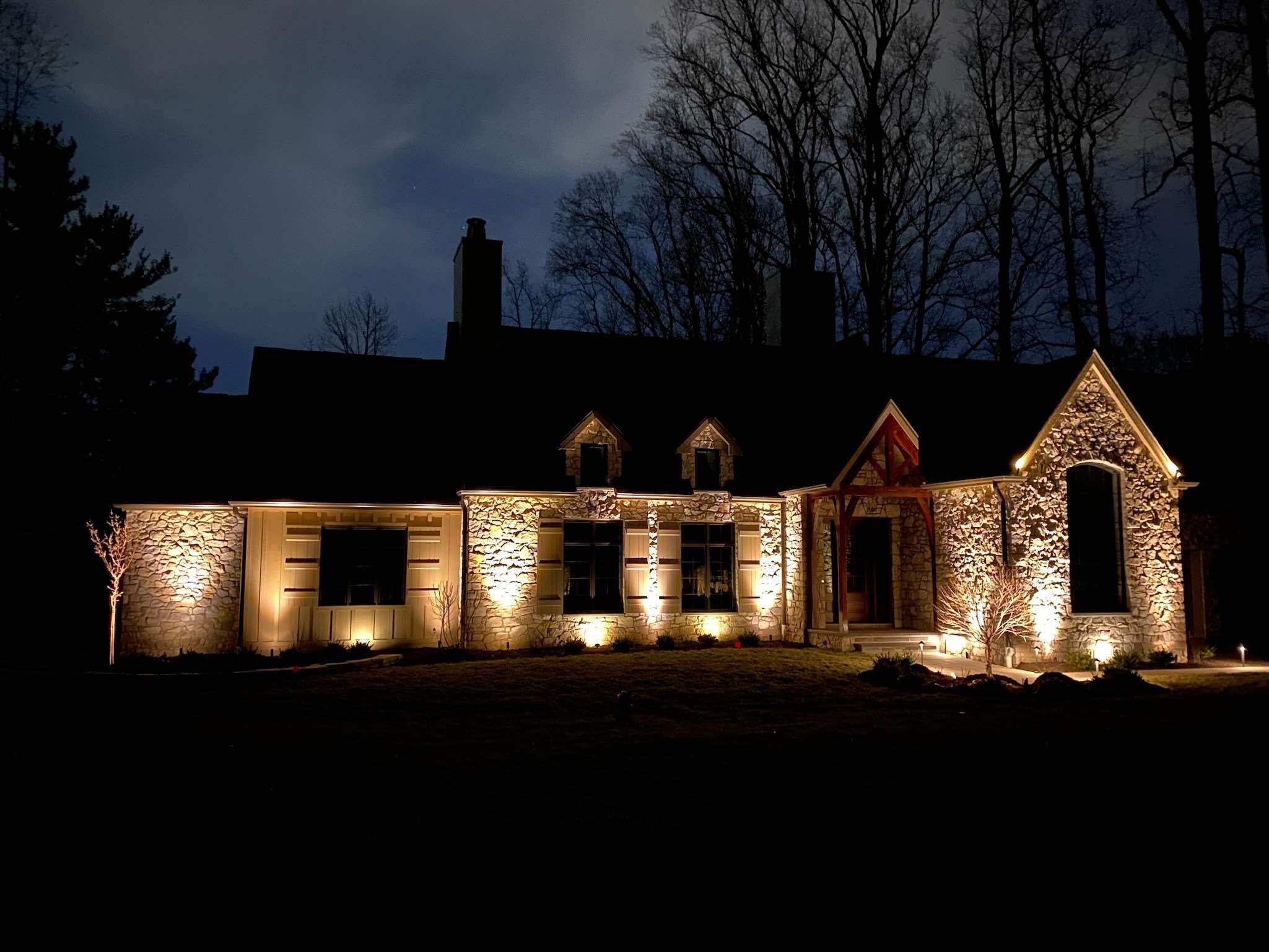 Front Exterior View of Home with Custom Outdoor Lighting by First Class Lawn Care