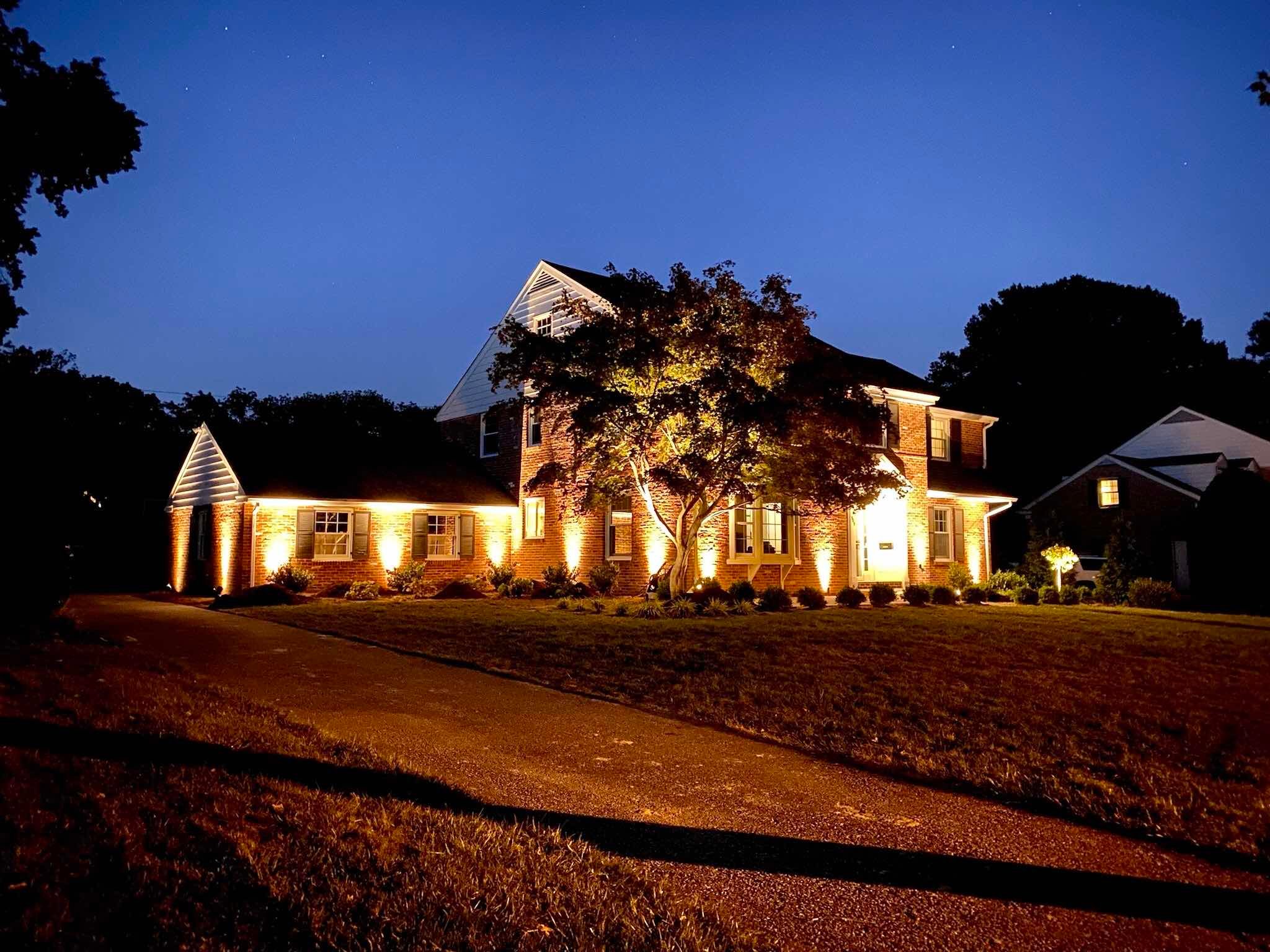 Night Time Exterior Of Landscaping by First Class Lawn Care