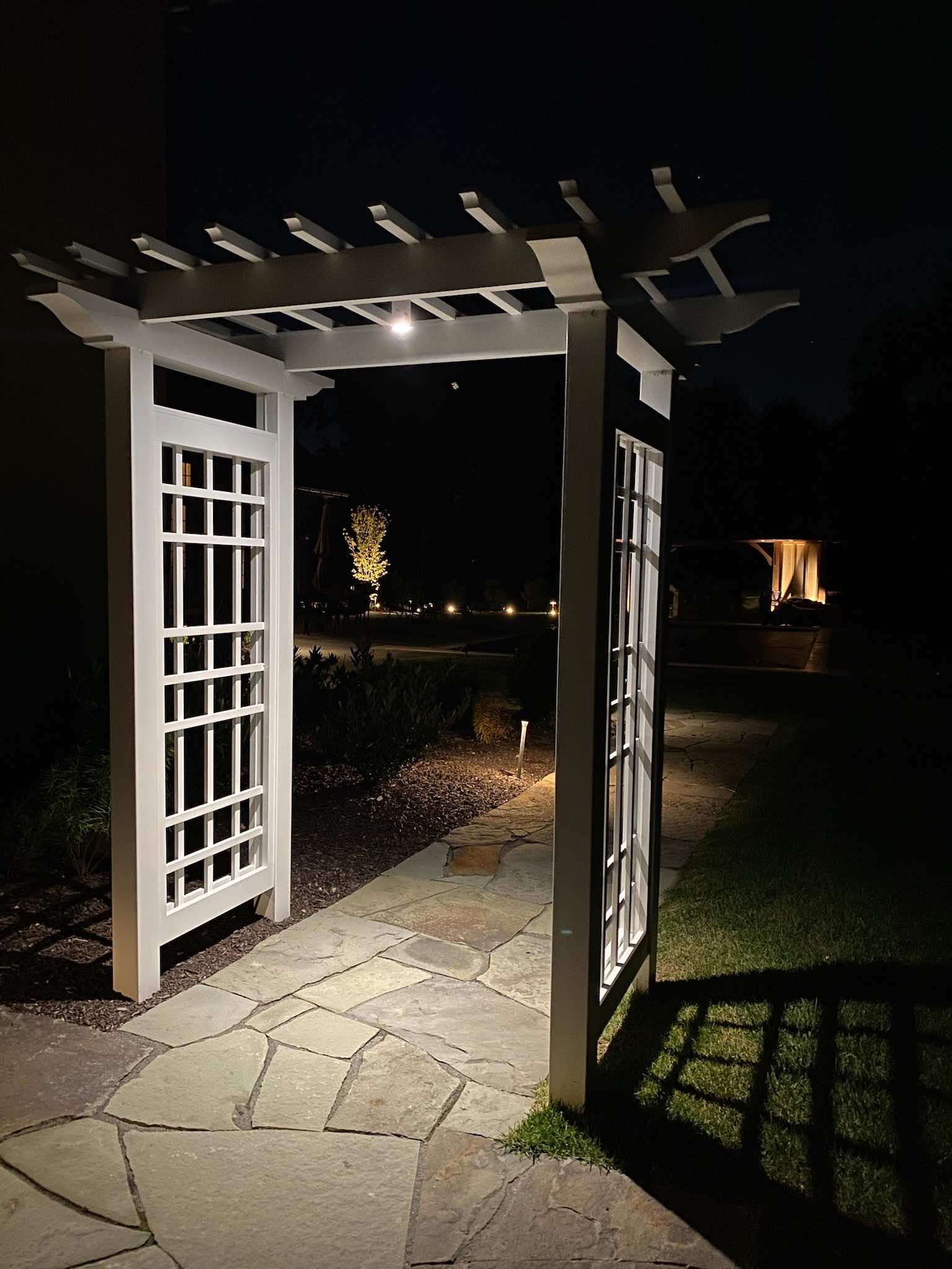 Trellis Over Custom Walkway by First Class Lawn Care