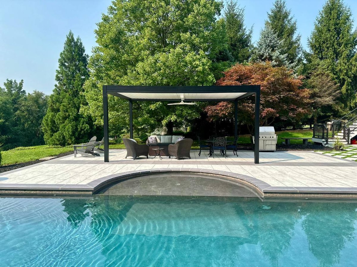 Piano pergola by pool in West Chester, PA by First Class Lawn Care